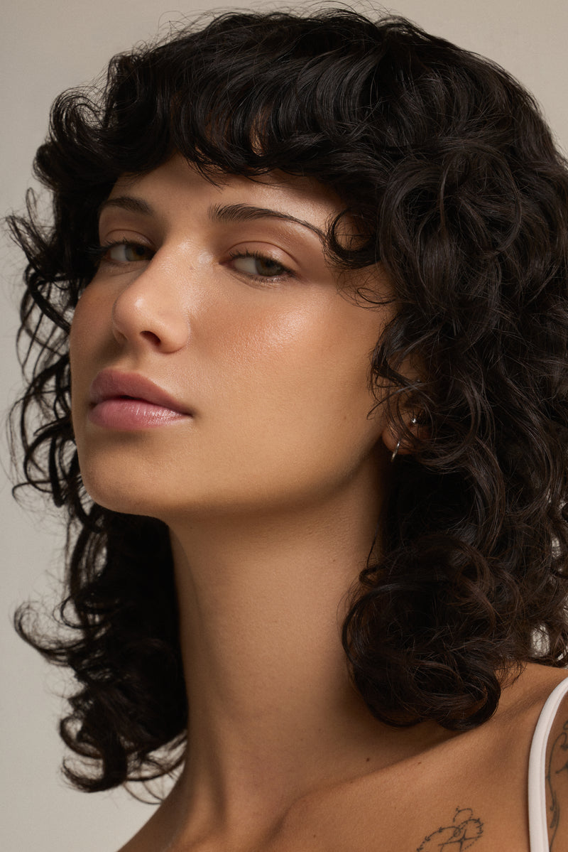 Clean, bare skin before applying the balm