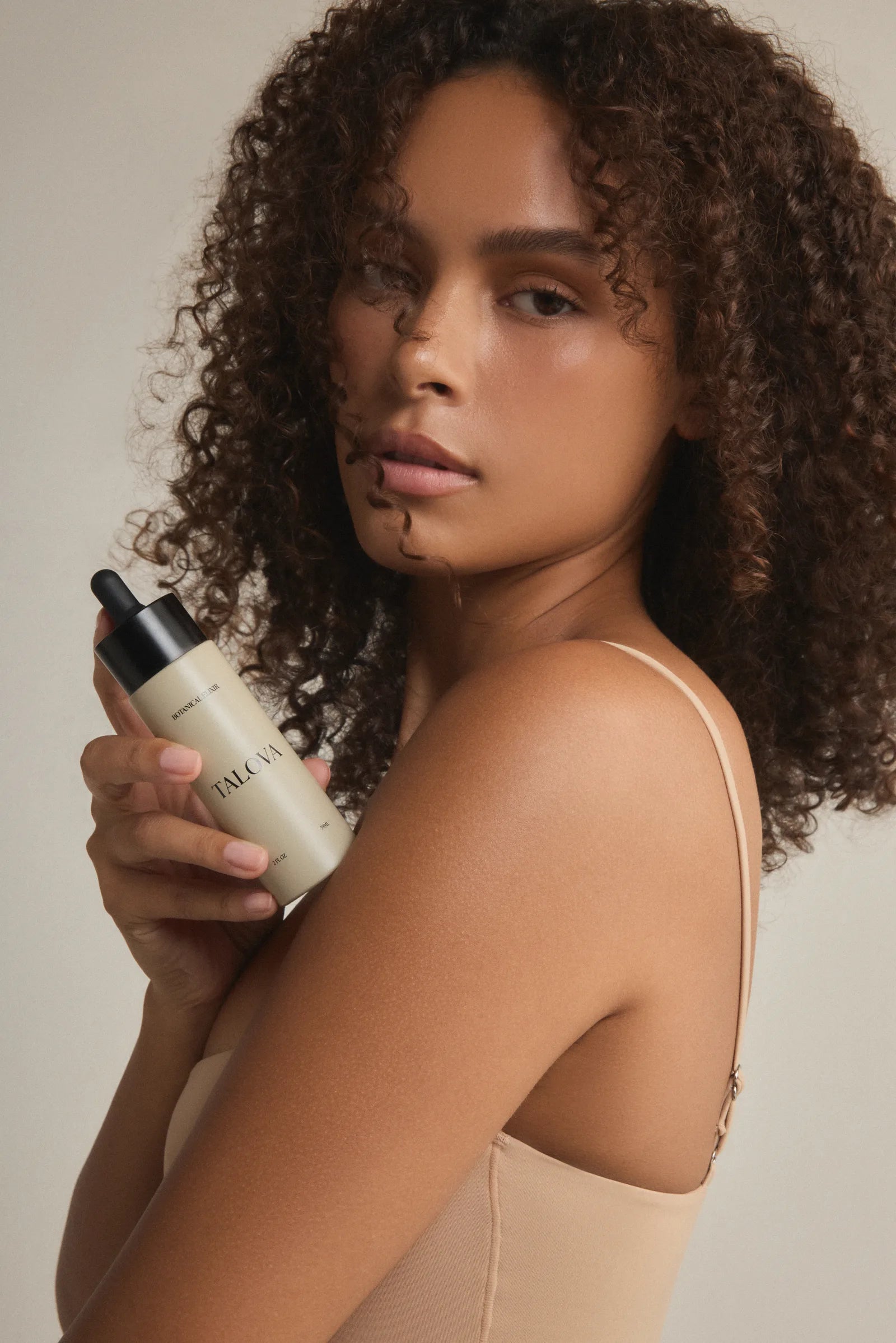 Botanical Elixir, Gua Sha, Steel Roller and reusable bag